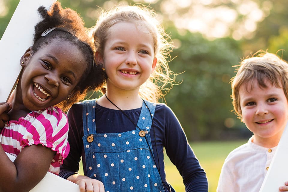 young children play outside