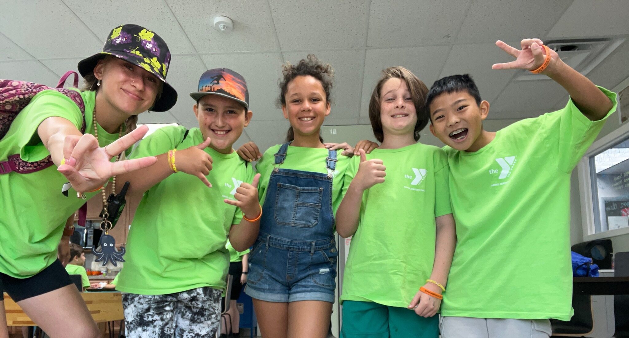 group of campers in y shirts smiling